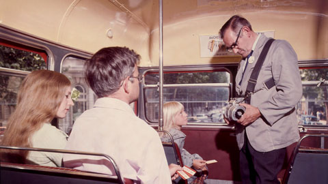 bus conductor collecting fares